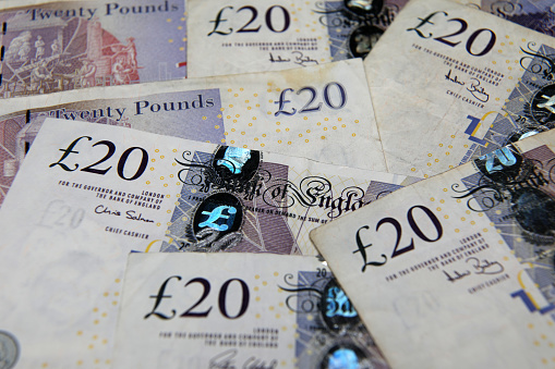 England, UK - December 31, 2015: Close up of English sterling fifty pound notes, England, UK, Western Europe.