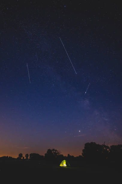 istock Vertical shot of a night sky with shining stars 1461019538