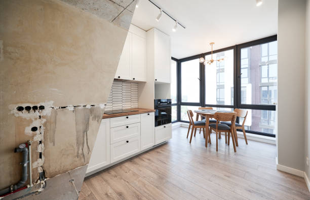 istock Apartment with panoramic window before and after renovation. 1461019927