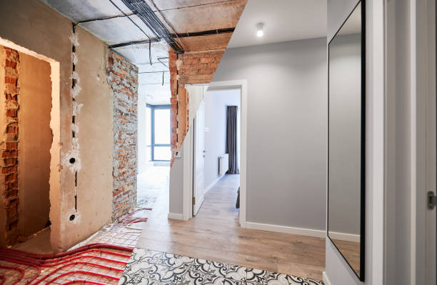 Apartment with heated floor before and after renovation. stock photo