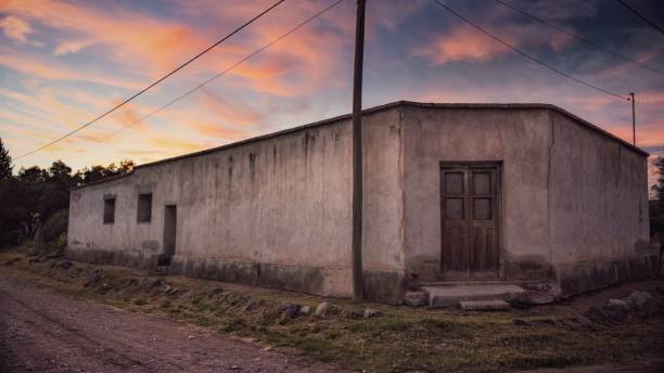 istock Old abandoned building with a beautiful sunset in the background 1461021496