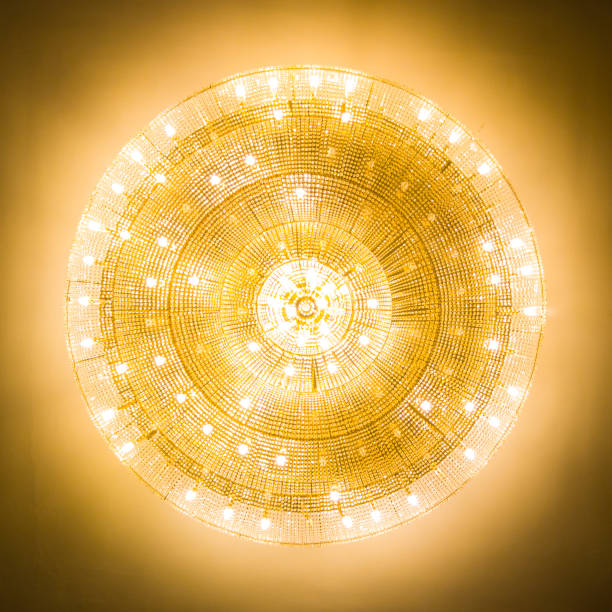 A low angle shot of a big shiny chandelier