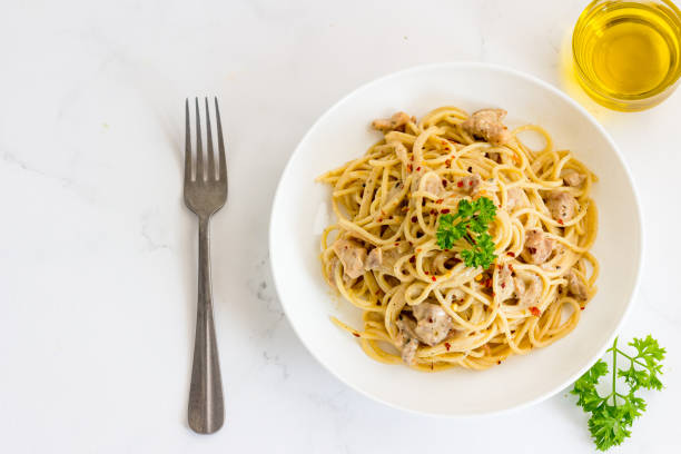 istock Chicken Spaghetti Pasta Garnished with Fresh Pasley Directly Above Photo 1461025906