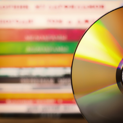 Isolated CD with refracted rainbow pattern. Some scratches and dust - just like every CD in your collection.