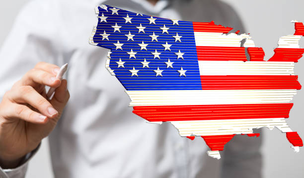 istock Digital 3D rendered flag of USA floating while a man holding a pen is pointing at it 1461027814