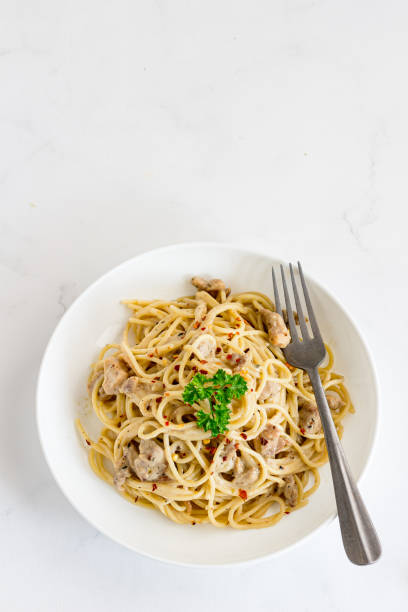 istock Spaghetti Chicken Pasta Directly Above Vertical Photo 1461029357