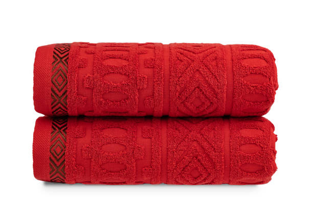 istock multicolored terry towels, rolled up and stacked on the table 1461029970