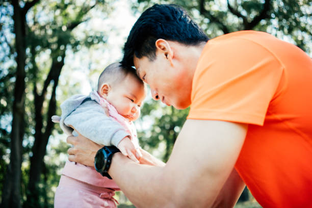 istock Father with baby girl 1461032620