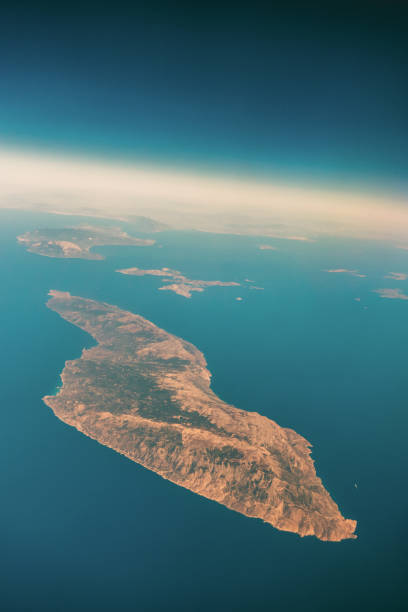 Aerial view over Ikaria island, Greece. Icaria is a Greek island in the Aegean Sea, 10 nautical miles (19 km) southwest of Samos. According to tradition, it derives its name from Icarus, the son of Daedalus in Greek mythology, who was believed to have fallen into the sea nearby.