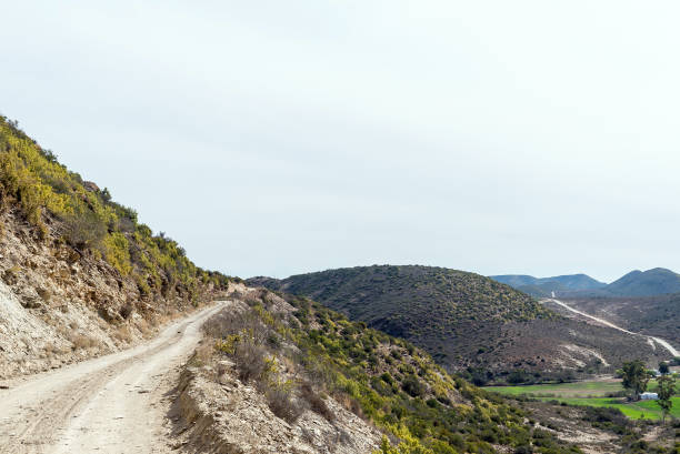 Looking back from the southern start of the Rooiberg Pass between Van Wyksdorp and Calitzdorp in the Western Cape Province. Farm buildings are visible