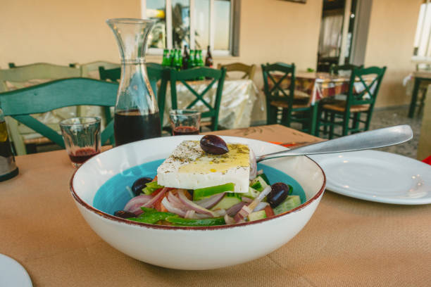 delicious greek salad and wine - salad food and drink food lettuce imagens e fotografias de stock