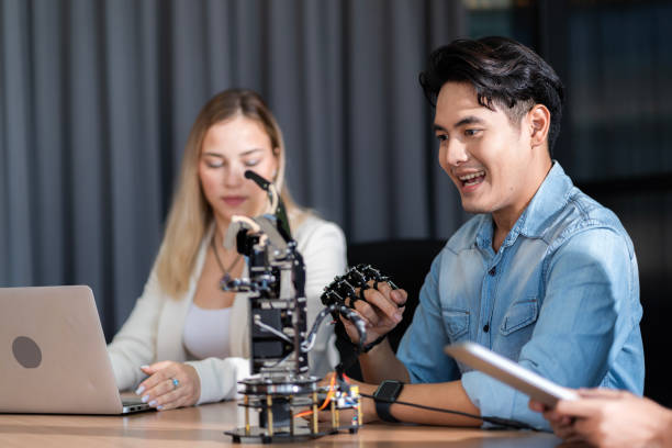 istock Young students researching inventions with modern technology in university libraries. 1461040829