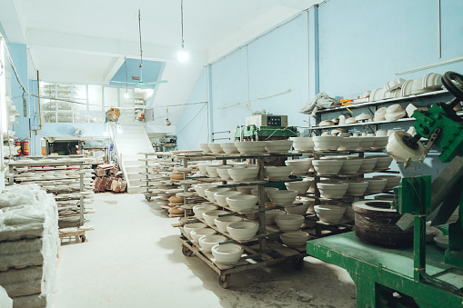 Untreated ceramic on the shelves at the porcelain factory near Hanoi, Vietnam
