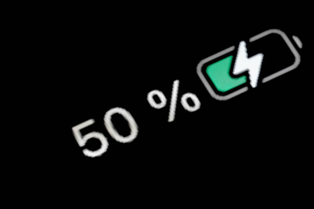 istock Battery level indicator charging process - white number - fifty, 50 percent 1461043004
