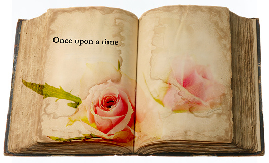 Old book with text and roses
