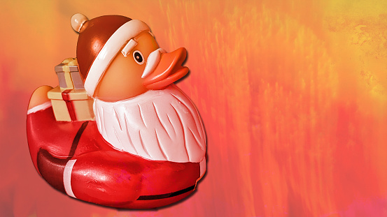 Santa duck on red and orange background