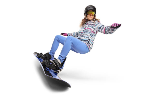 istock Young woman riding a snowboarding 1461046980