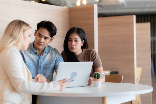 istock Young students researching inventions with modern technology in university libraries. 1461047783