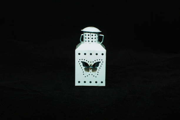 istock Beautiful fire candle lantern in a large photo studio 1461053150