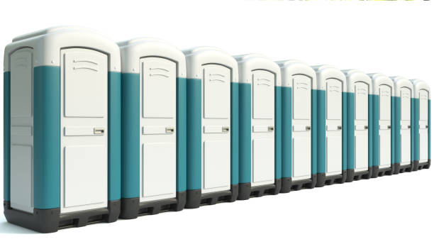 istock Row of portable toilets isolated on white background 3d rendering 1461057229