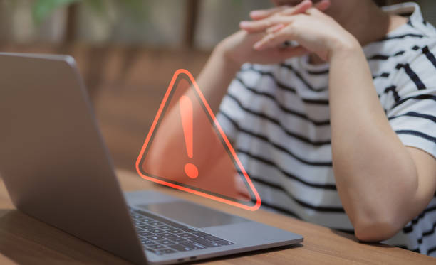 istock Warning alert system concept, system hacked on computer network, cybercrime and virus, Malicious software, compromised information, illegal connection, data breach cybersecurity vulnerability, 1461059269
