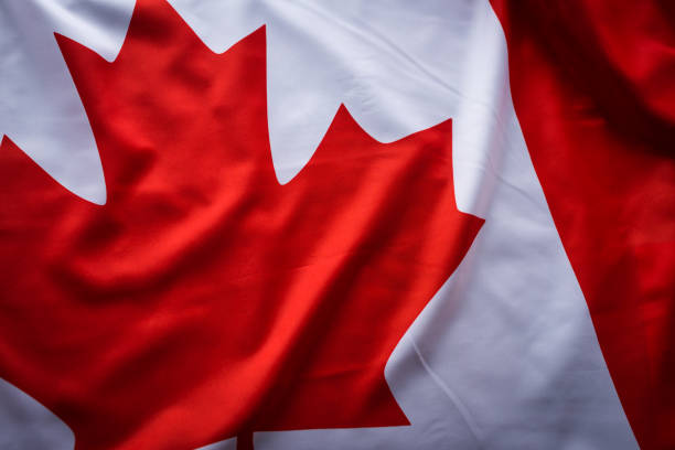 実質のカナダの旗のスタジオ ショットを閉じる - canadian culture flash ストックフォトと画像