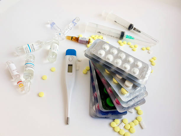 istock Pharmaceuticals. Antibiotics, various pills, syringes, ampoules on a white background. 1461065104