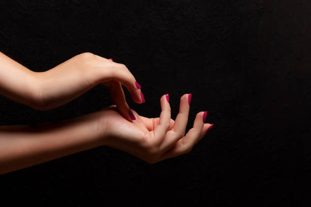 istock Female hands with viva magenta, pink nails 1461067618