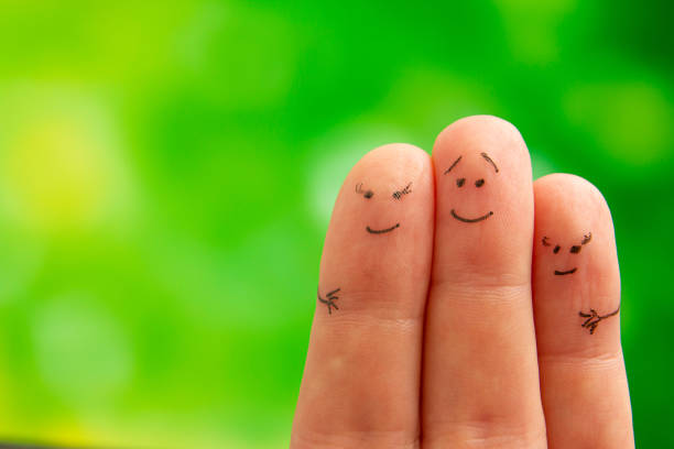 istock Happy family concept. Having fun outdoors and smiling. Fingers. 1461067765