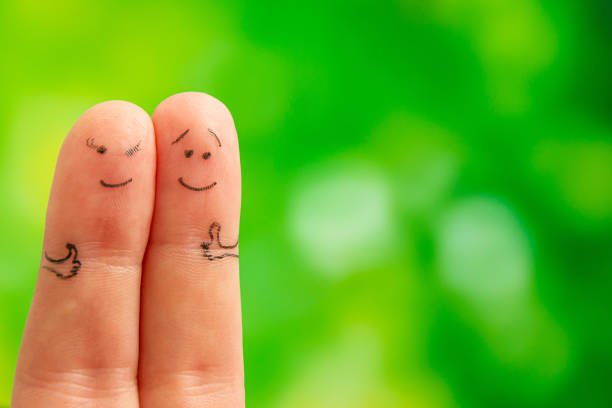 istock Happy family concept. Having fun outdoors and smiling. Fingers. 1461068384