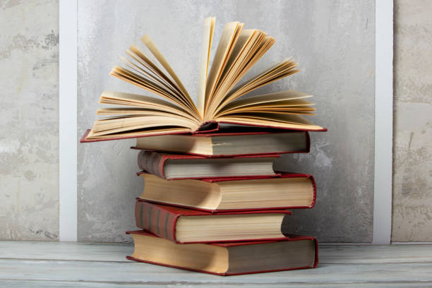 istock Vintage old hardback books. Education background. Back to school. Copy Space. 1461068447
