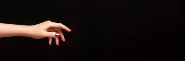 istock Female hand with viva magenta, pink nails banner 1461069323
