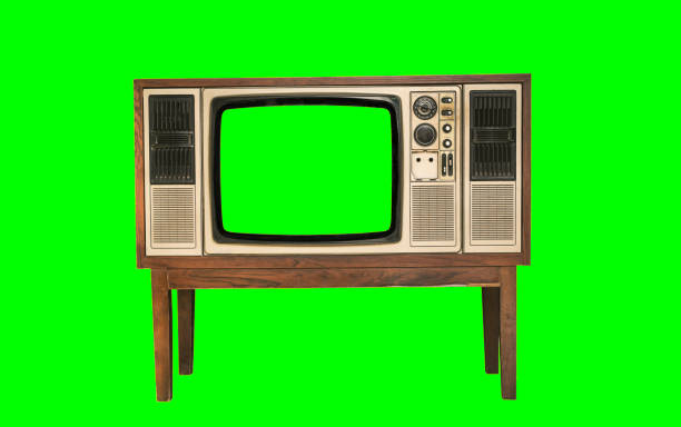 istock Retro old television with blank green screen standing isolated on green background and clipping path. 1461069417