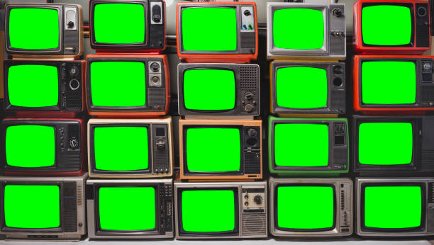 istock Twenty vintage televisions with chroma key green screen for designer. Pattern wall of pile old retro TVs 1461069436
