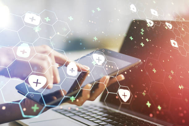 istock Creative abstract medical hologram and finger presses on a digital tablet on background, online medical consulting concept. Multiexposure 1461069711