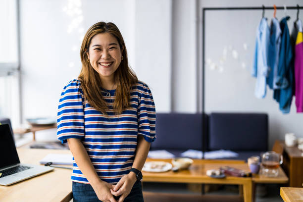 istock Female fashion designer in her loft studio 1461074027