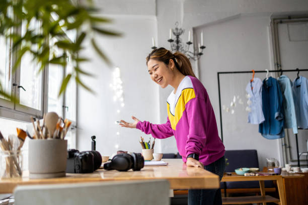 istock Female fashion designer in her loft studio 1461074836