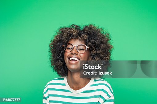 istock Spring portrait of excited young woman 1461077577
