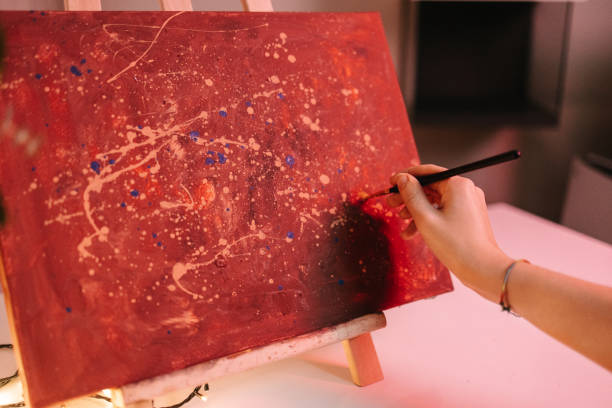 istock Painting a picture on canvas 1461079418
