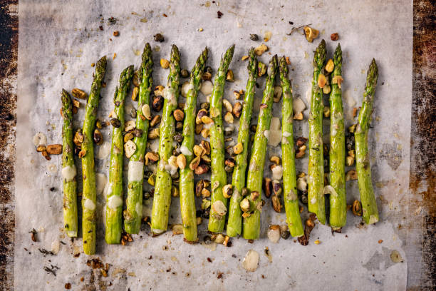 Roasted Asparagus with Pistachios and Thyme. stock photo