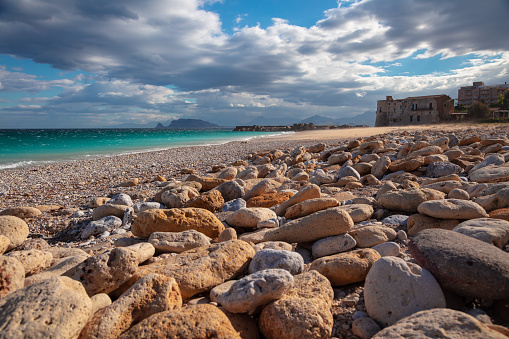 Landscape image of beautiful Virgin Mary Beach located near Palermo, Sicily at sunny day.