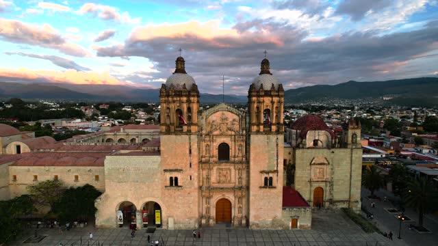 drone shot of santo domingo temple world heritage site in oaxaca city mexico at sunset