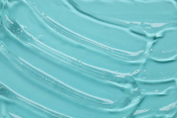 istock Cosmetic transparent gel texture on blue background. 1461090732