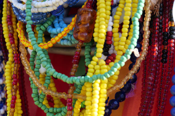 istock Close up of strings of colorful glass beads.  Vertical image 1461091497