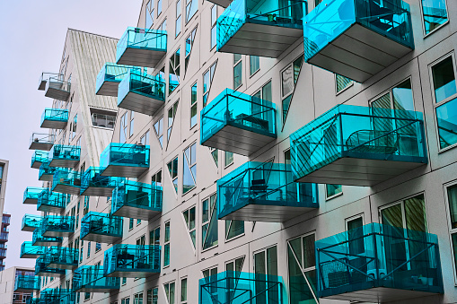 Modern building on Aarhus Island. Houses with blue balconies