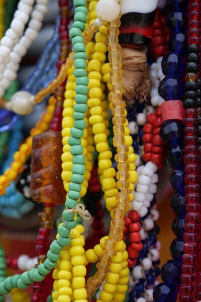 istock Close up of strings of colorful glass beads.  Vertical image 1461093059