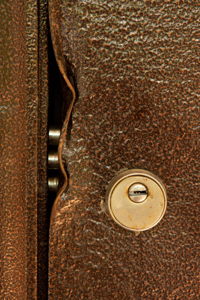 istock large durable lock is broken in a metal door close-up 1461094693