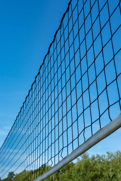 istock beach volleyball net against the blue sky on the beach 1461094784