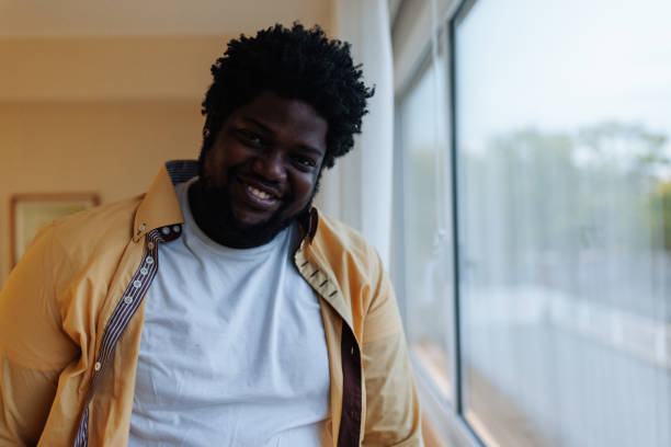 istock African American man in apartment. 1461094857