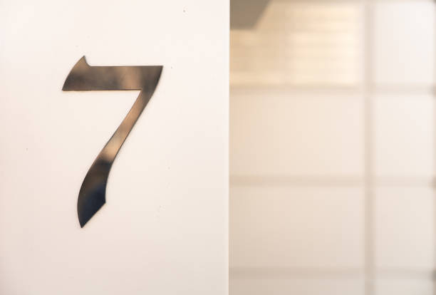 istock Close-up of white house number 1461095878